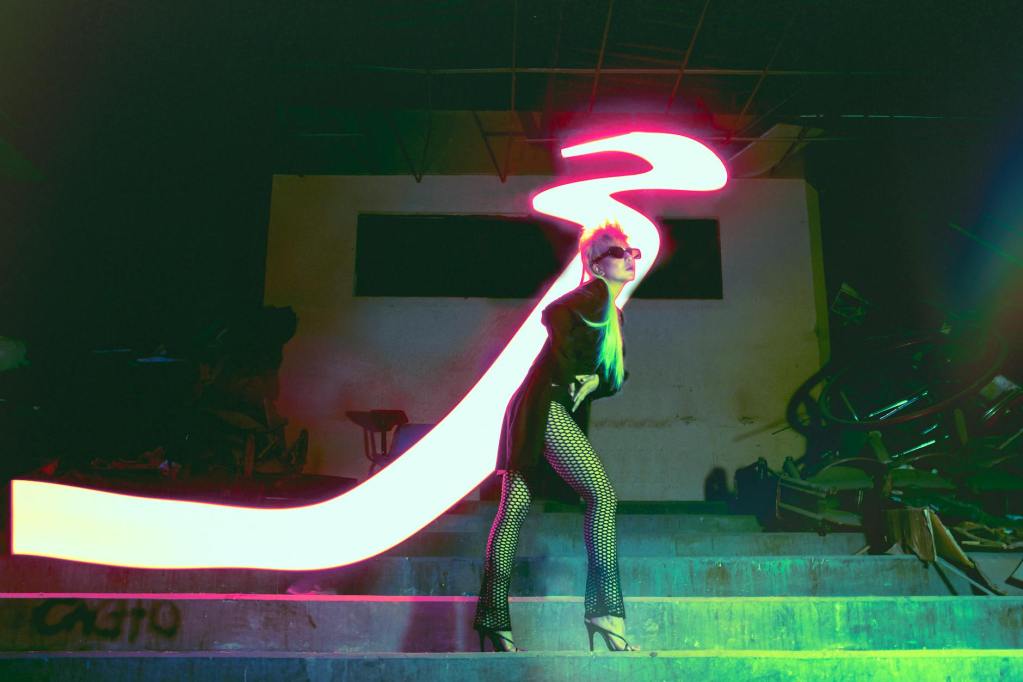 woman standing on the stair posing