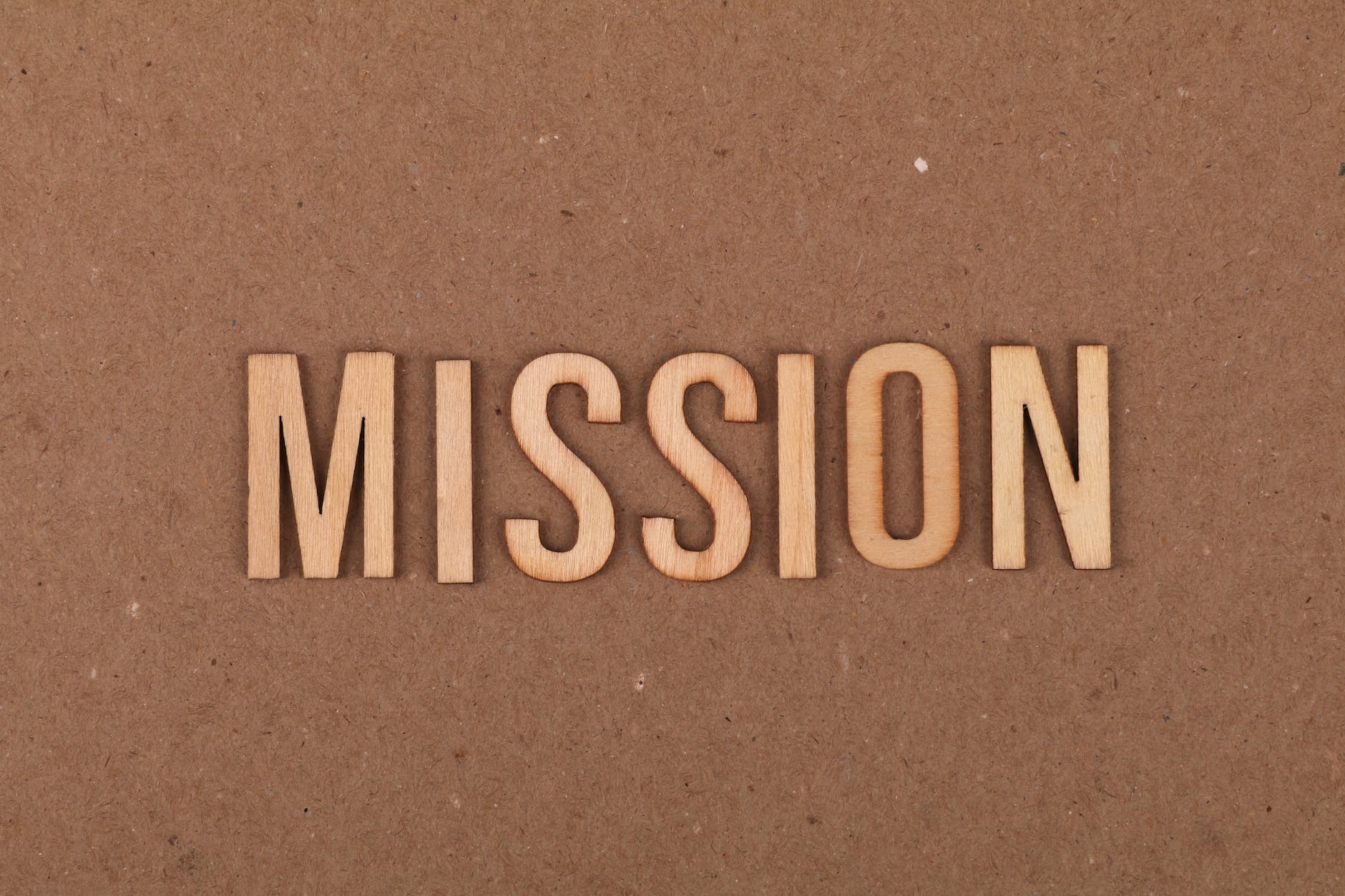 wooden letters on a cardboard