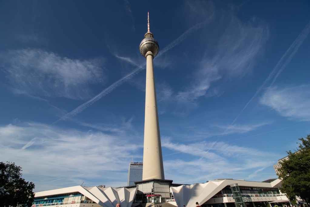 exterior of berlin tv tower against blue sky