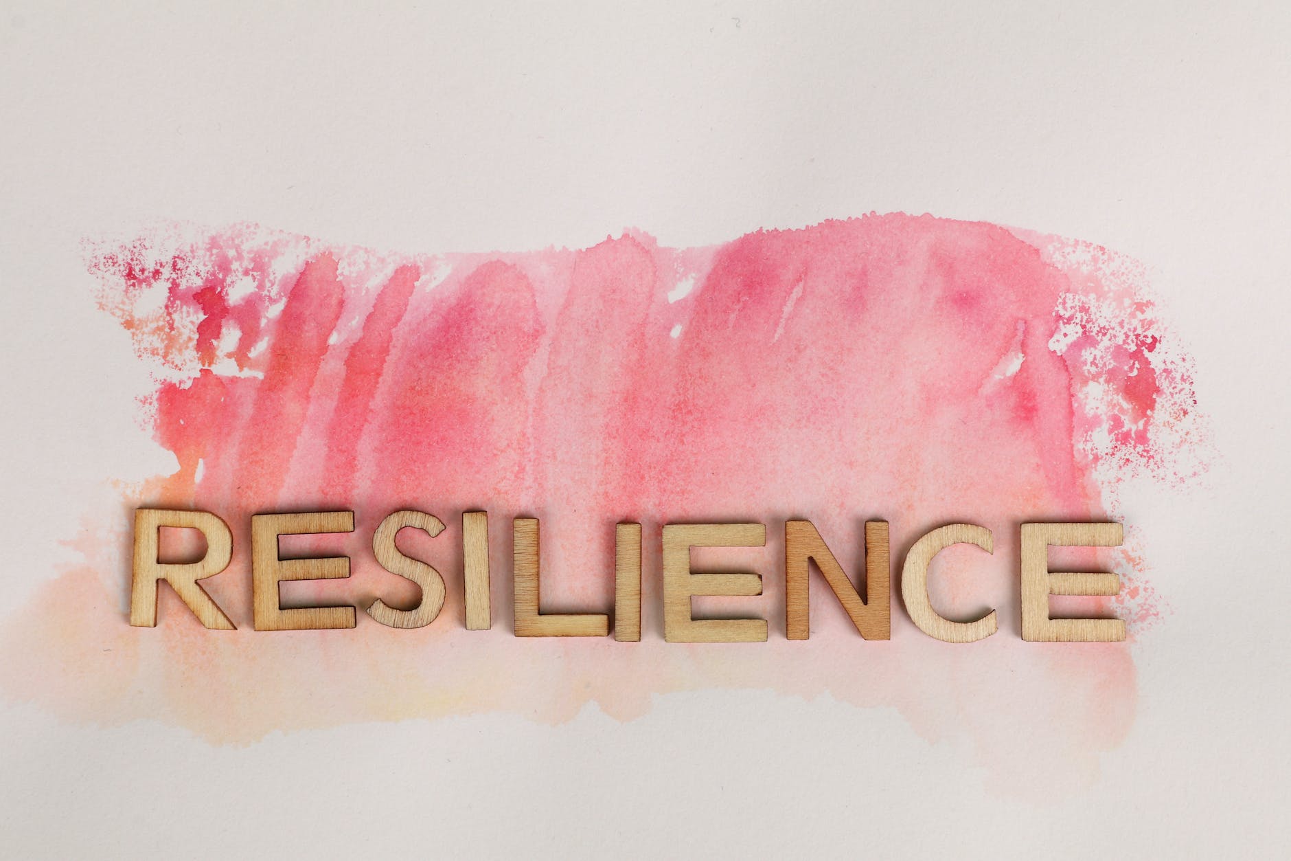 resilience text on pink ink